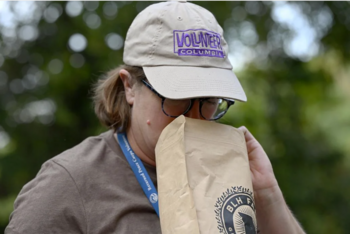 Volunteer learning to compost